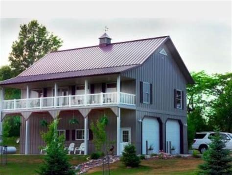 2 story cream house with porch with metal roofing|two story metal house interior.